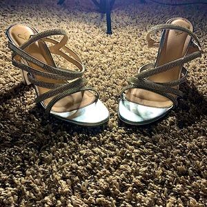 I am selling some silver wedge heels.